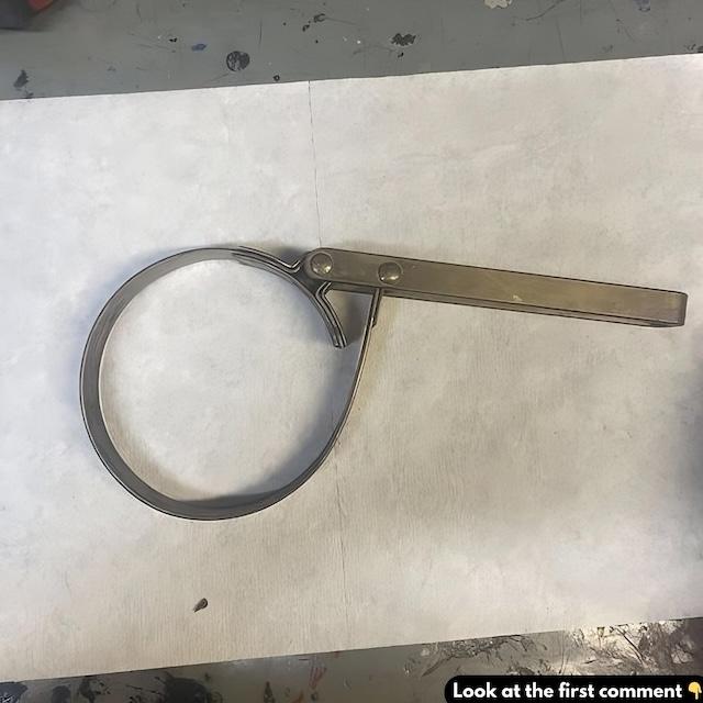 A tough, reliable tool used for decades to loosen stubborn oil filters